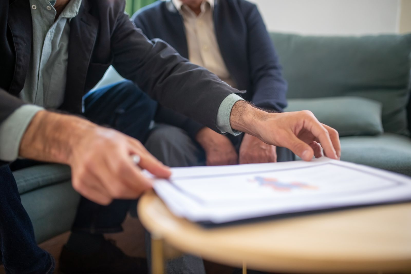 Business professionals working through documents together